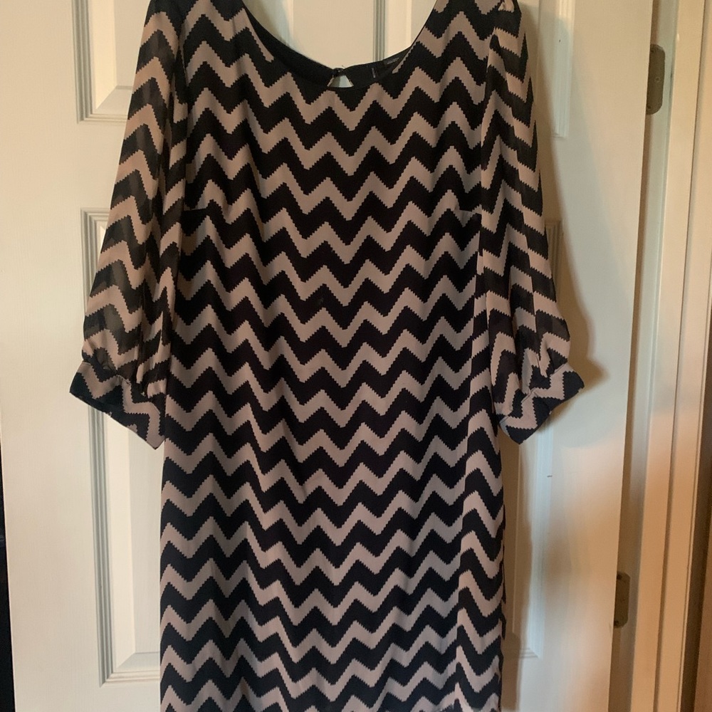 Ladies dress. Tan and black. Shoulder to hem 37.5 inches. Bust width 22 inches